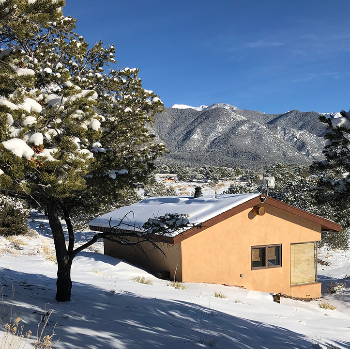 Solitary cabin in the snow at Miyo Samten Ling