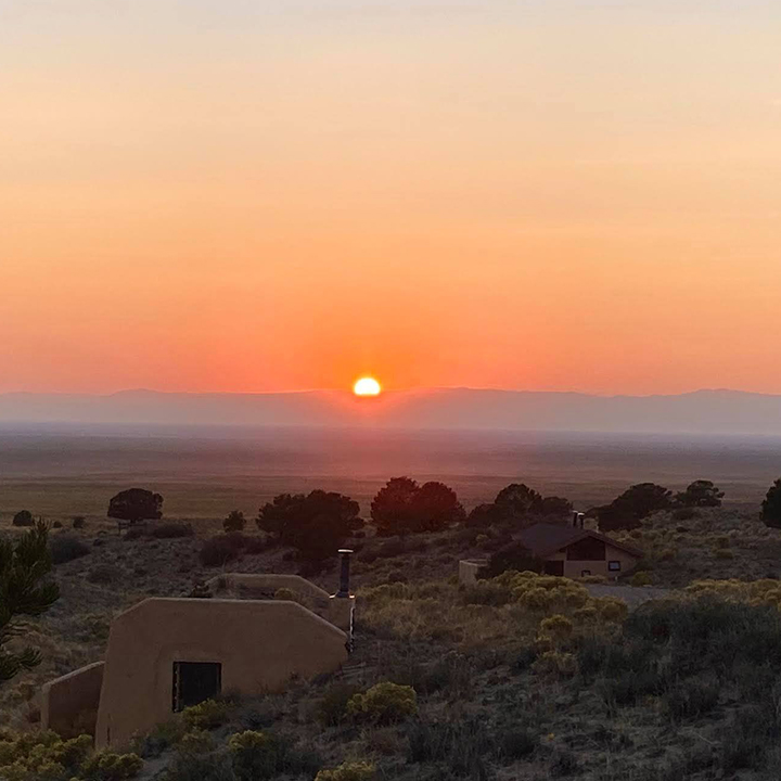 Sunset and solitary cabin at Miyo Samten Ling